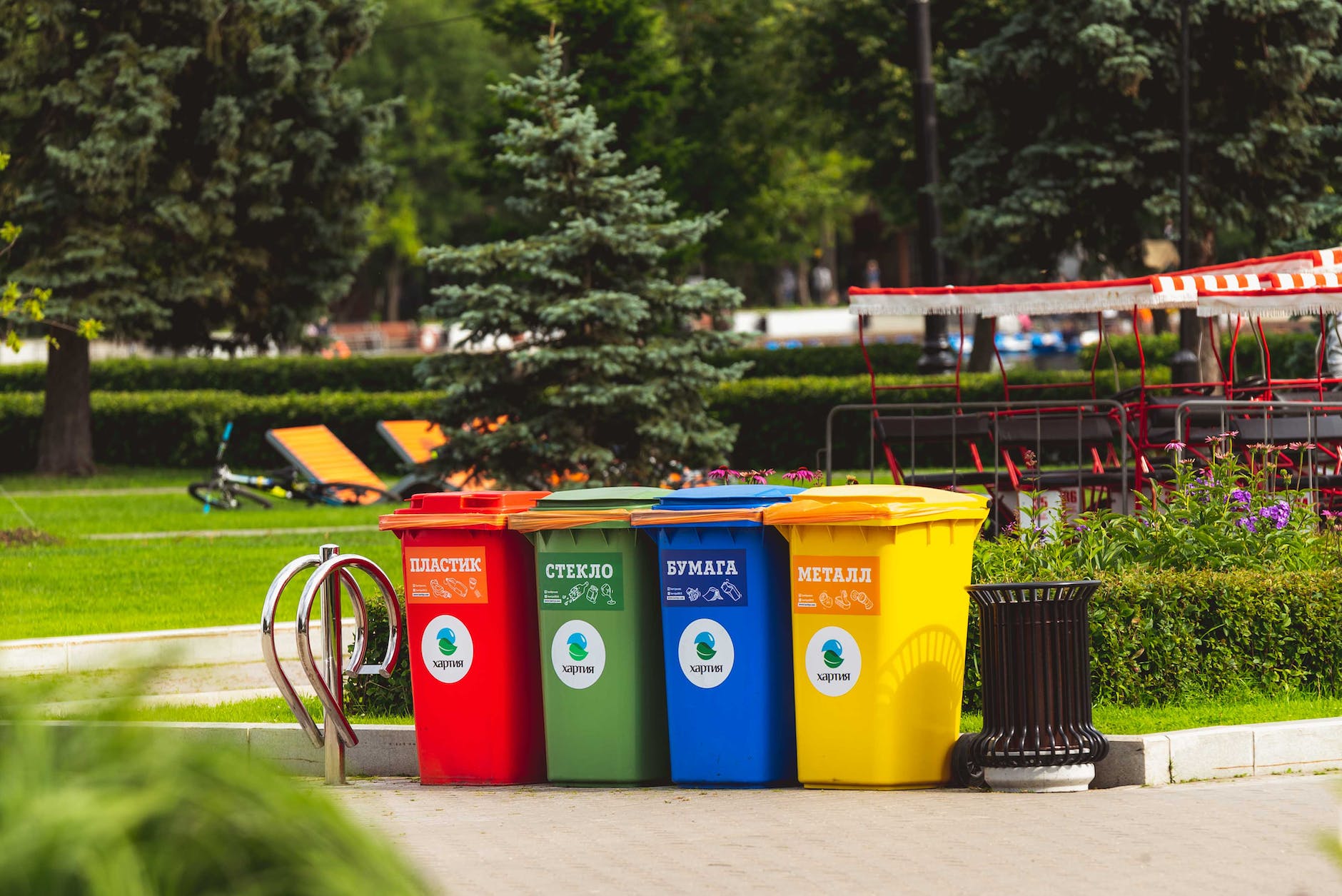 assorted color plastic trash bins